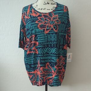 Lularoe Irma S Hawaiian Floral Patterned Short Sleeve Top in Blue and Orange